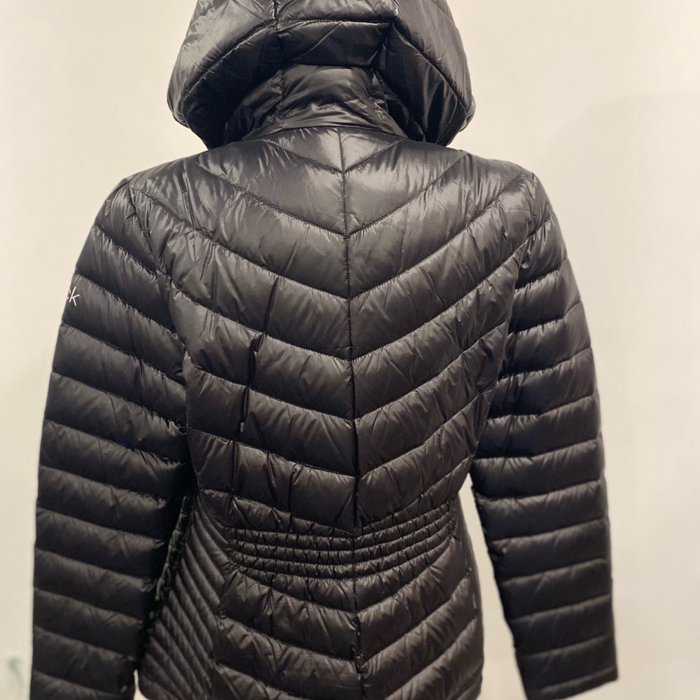 - Calvin Klein
lightweight hooded puffer jacket